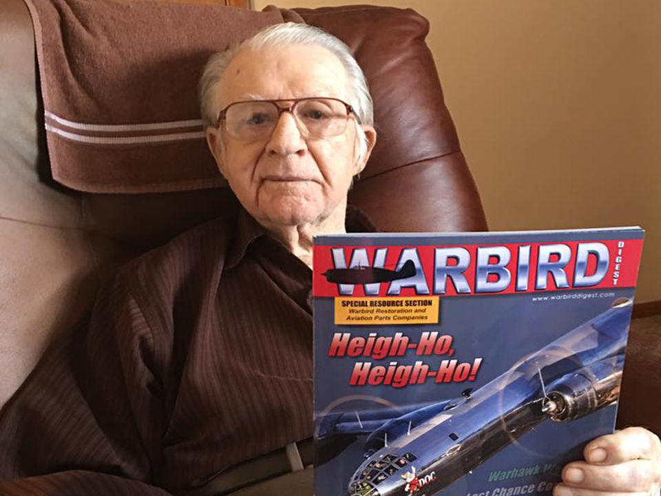 Articles - Ferrill Purdy holding Warbirds magazine