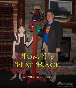 Tom and girl posing with hat rack for Tom T's Hat Rack