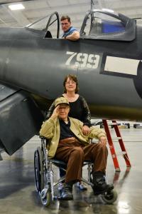 corsair private event_man in plane and woman behind Purdy's wheelchair