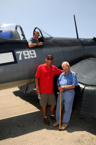 Planes of Fame - August 6, 2016 - 3 guys posing with corsair